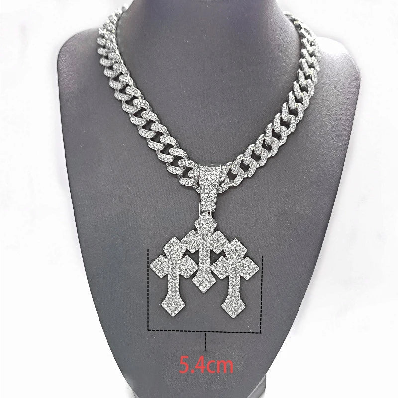 COLGANTE CRUZ TRIPLE BRILLANTE CON DIAMANTES