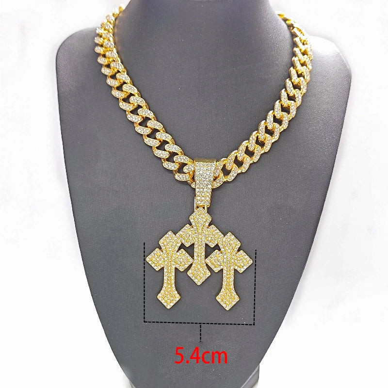 COLGANTE CRUZ TRIPLE BRILLANTE CON DIAMANTES